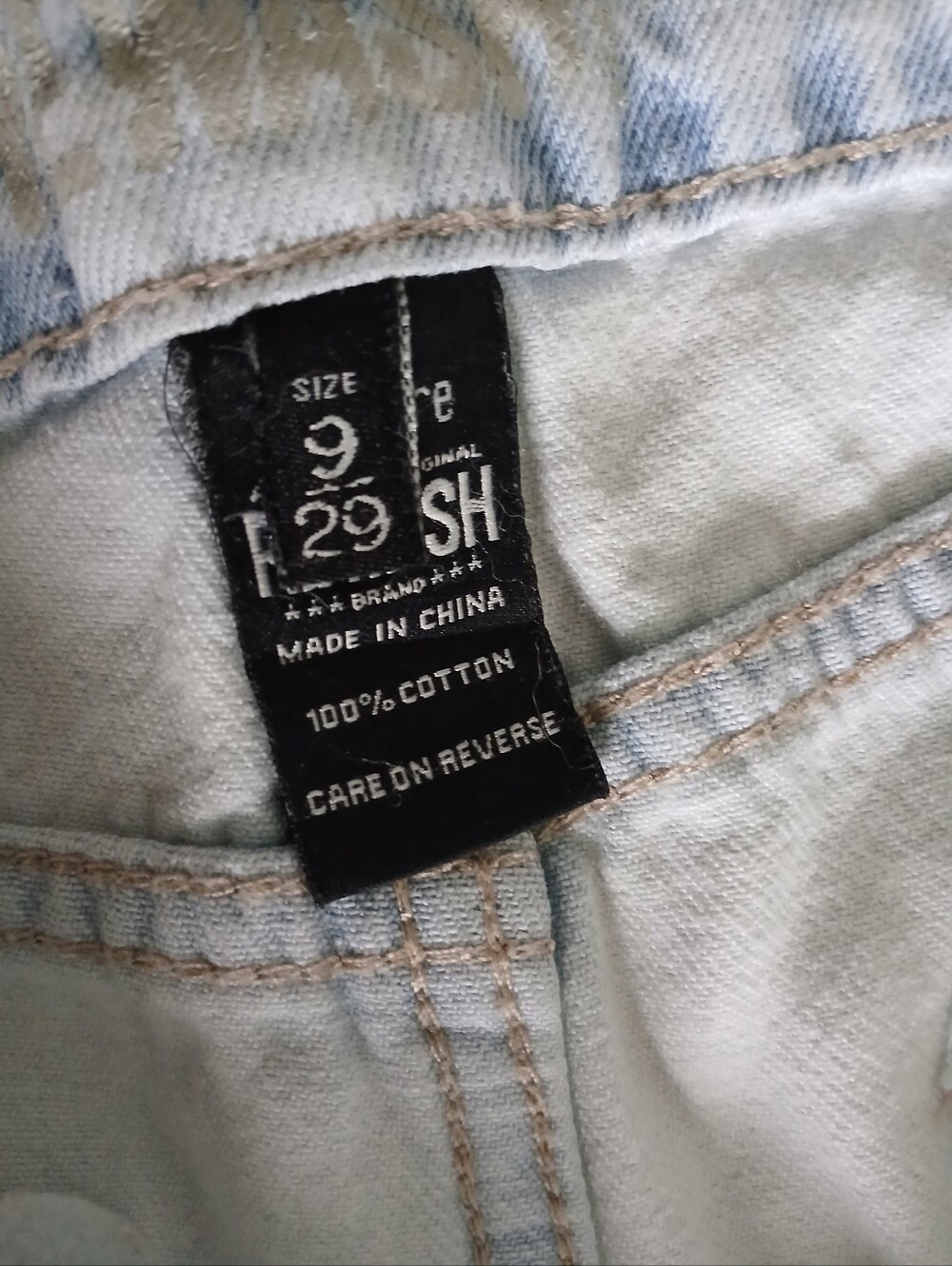 Women's acid wash denim cutoff shorts with hand stitched embroidery - Picture 5 of 5